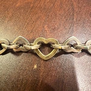 Tiffany’s sterling silver and 18k gold heart link bracelet approx. 7 inches.